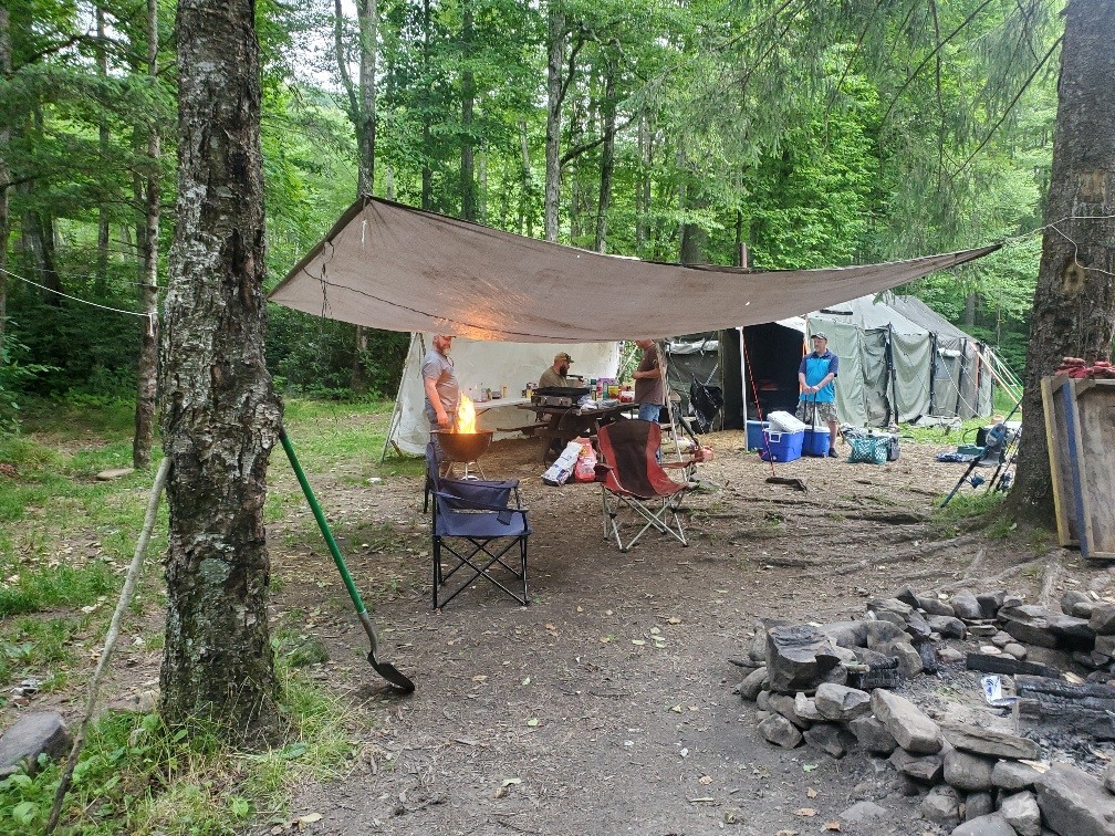 Millwood team members at their camp site