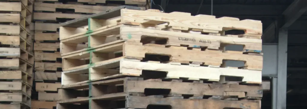 used pallets in millwood's warehouse