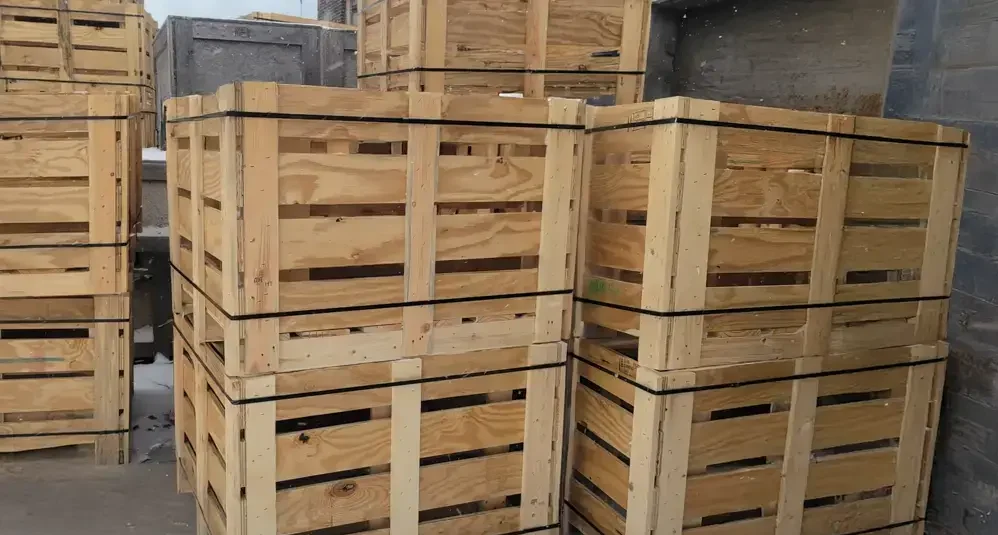 An application photos of stacked wirebound crates