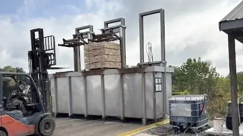 an application photos of wood treatment using dip tank