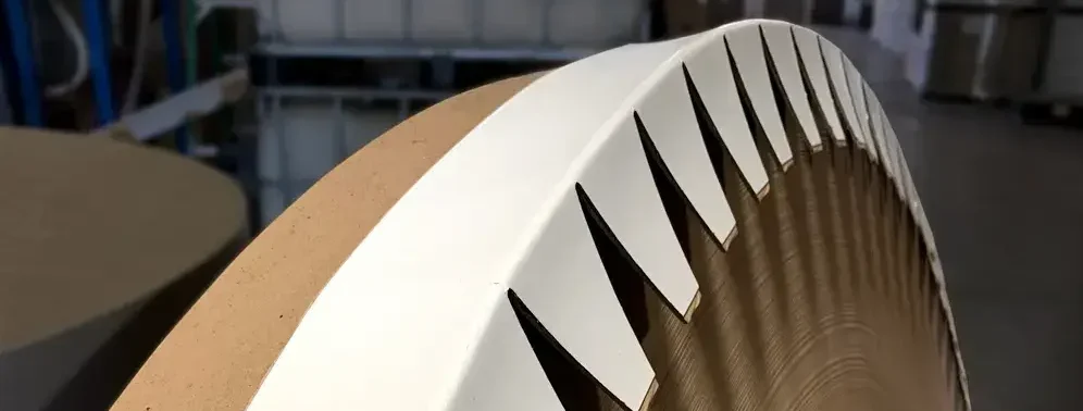 A Millwood Inc. Flex Defender on a large paper roll.