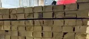 Stacks of Packaging Lumber sit stacked in a Milwood warehouse.