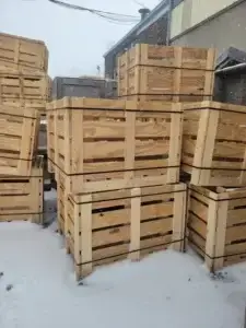 Crates stacked up outdoors on snow
