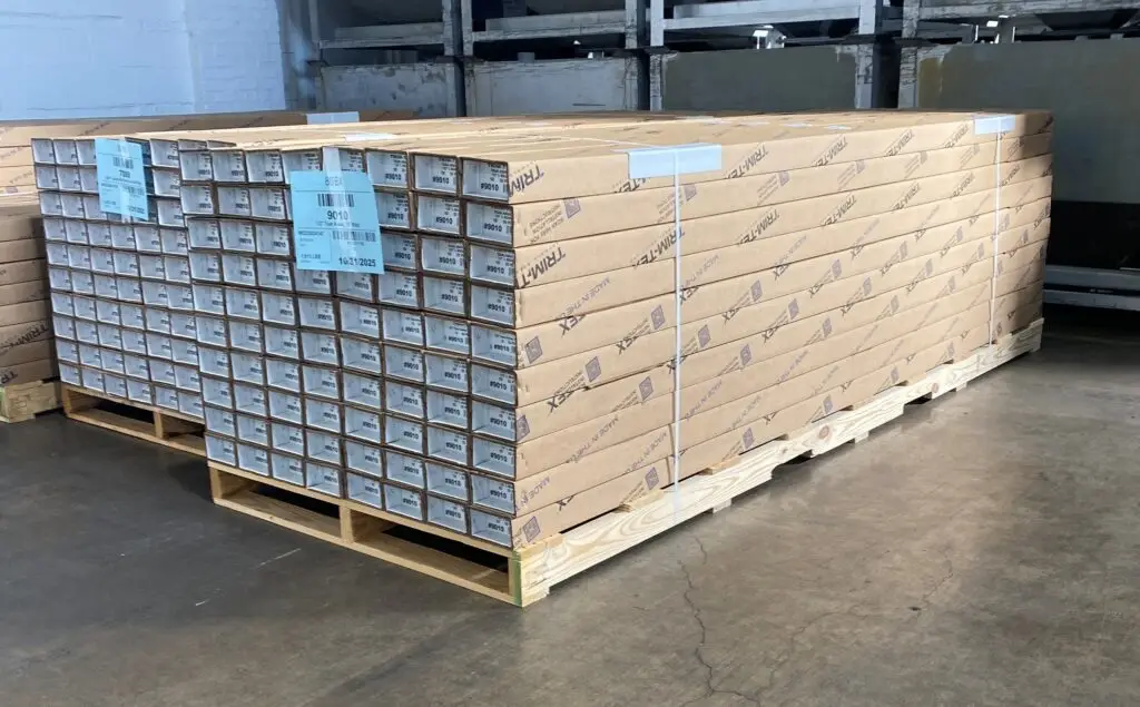 Custom pallets designed for oversized loads, carrying products and ready for shipment.