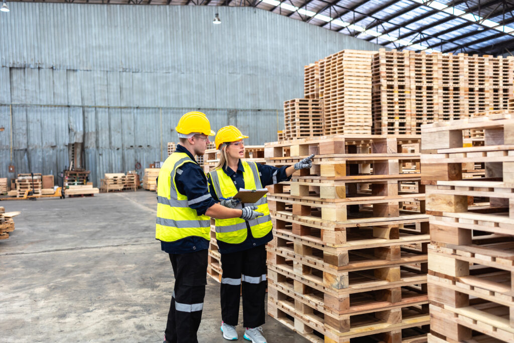 Different pallet types supporting packaged unit loads in a warehouse and packaging testing environment.