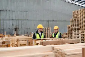 Uniform standardized pallets in a warehouse demonstrating supply chain quality control through strategic sourcing