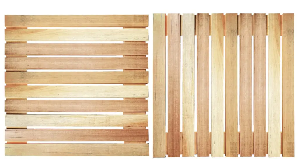 Close-up overhead view of wood pallet deck boards, both in standard pallet sizes, showing board width, spacing and grain detail