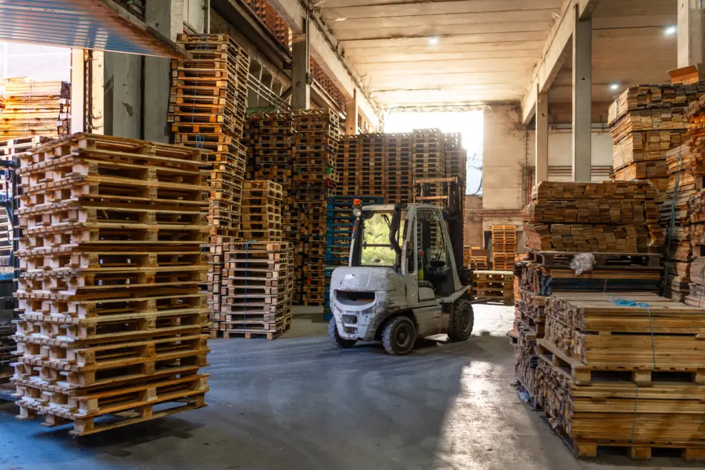 Repaired and sorted wood pallets staged at a Millwood recycling facility, ready for redeployment into the supply chain.