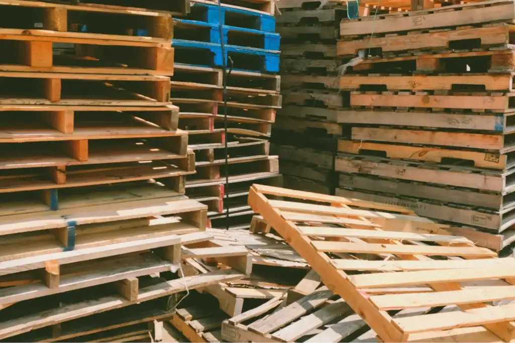  Pallet handling safety was ignored in this warehouse, leading to pallet damage and general chaos as pallets lay discombobulated everywhere. 