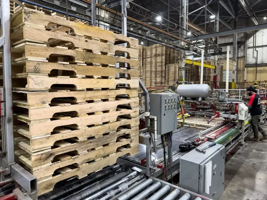 Pallet automation on a Millwood production line where automated systems deliver consistent dimensions for demanding supply chain applications.